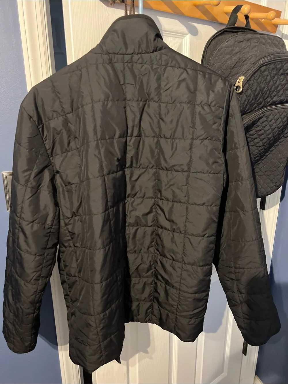 The North Face Black Jacket with white embroidered Tag Detail